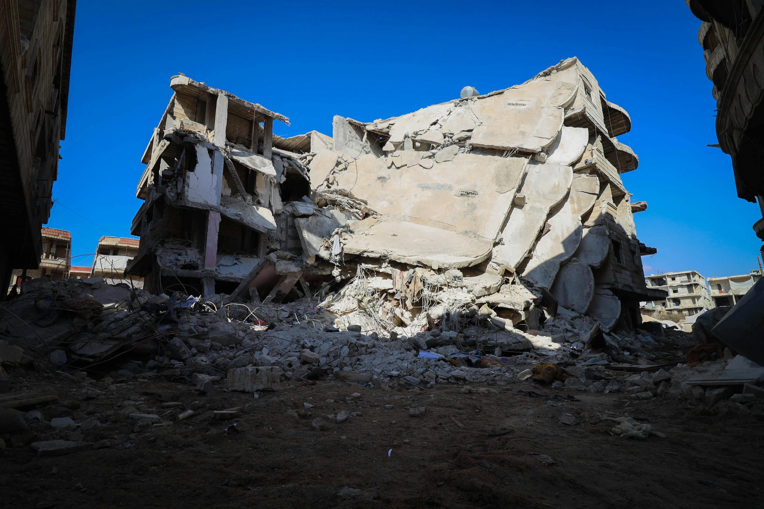 A demolished building in Idlib, Syria, showcasing the aftermath of destruction.